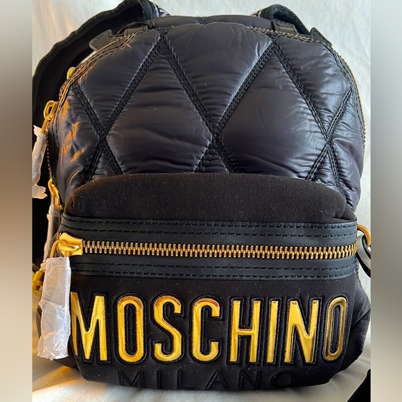 Moschino Handbags - 💯% Authentic Moschino Logo Black Quilted Backpack